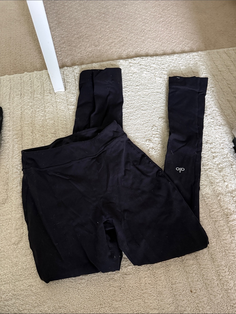 ALO Yoga Black bootcut legging with leg slit